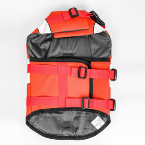Adjustable straps on orange dog life jacket